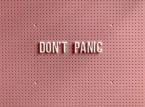 Words Don't Panic on red background